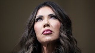 Homeland Security Secretary Kristi Noem looks up during a House hearing