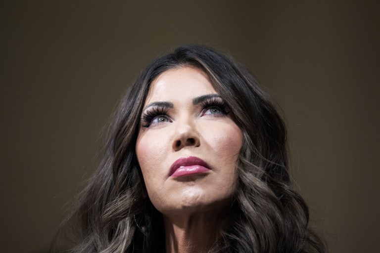 Homeland Security Secretary Kristi Noem looks up during a House hearing