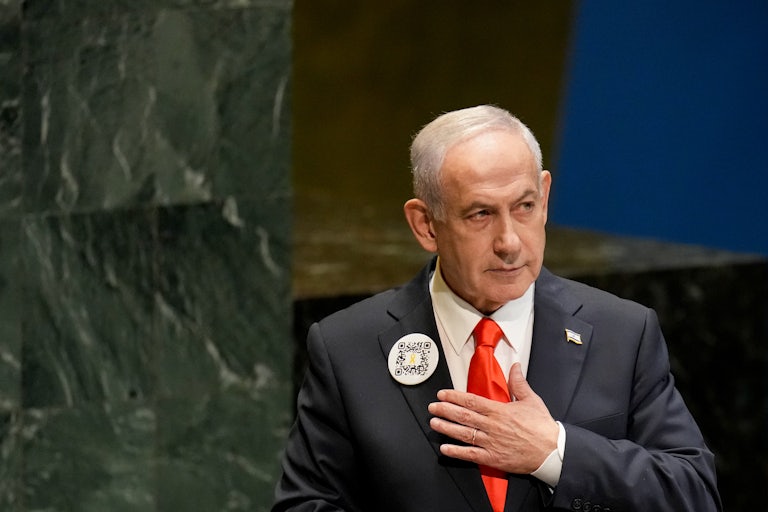 Benjamin Netanyahu holds his hand over his heart as he speaks at the United Nations