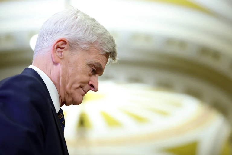 Bill Cassidy with his head pointed downward.