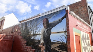The mural,“Take My Hand,” painted by artist Michael Rosato, at the The Harriet Tubman Museum & Educational Center in Cambridge, Maryland