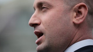 Stephen Miller speaks to reporters outside the White House