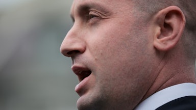 Stephen Miller speaks to reporters outside the White House