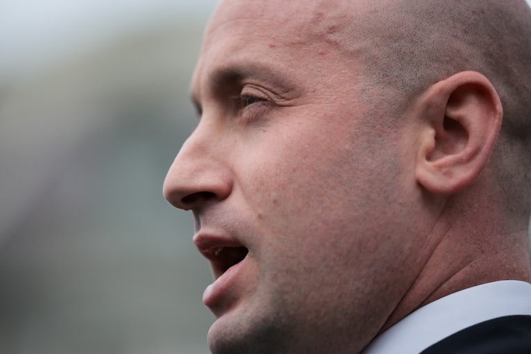 Stephen Miller speaks to reporters outside the White House