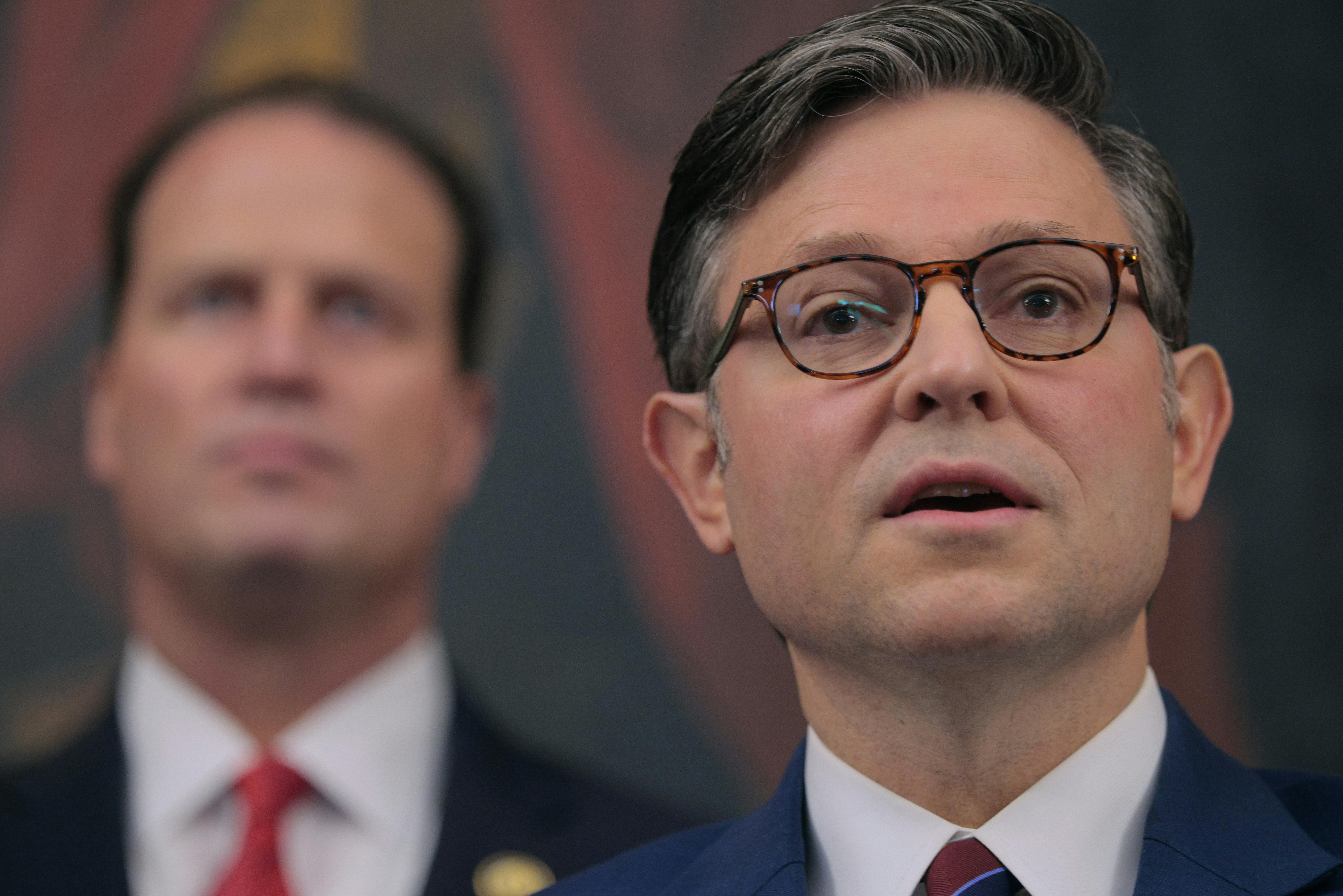 House Speaker Mike Johnson speaks during a press conference
