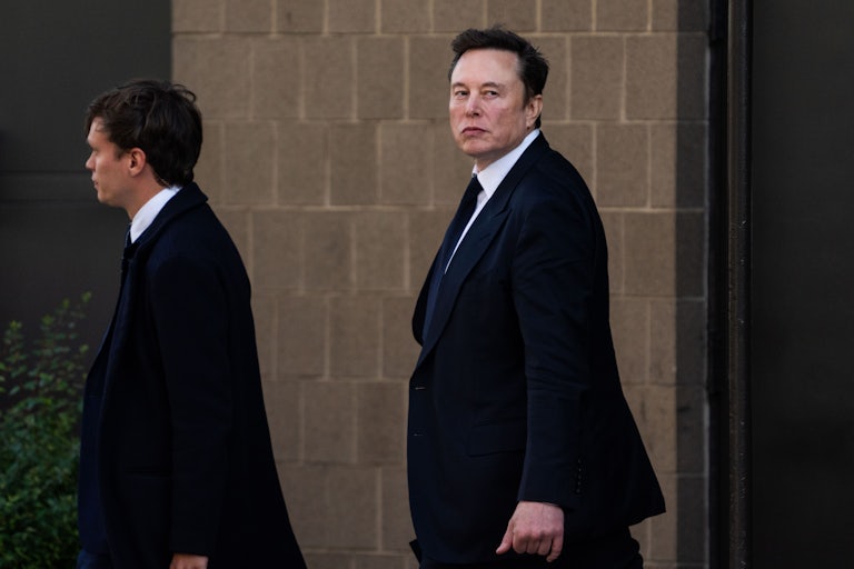 Elon Musk walking outside