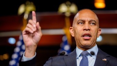 House Minority Leader Hakeem Jeffries raises his finger while speaking during a press conference