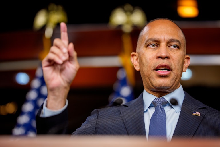 House Minority Leader Hakeem Jeffries raises his finger while speaking during a press conference
