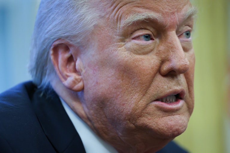 Donald Trump speaks to reporters in the Oval Office