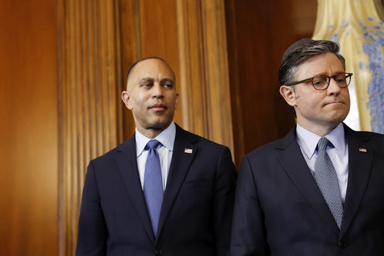 Hakeen Jeffries and Mike Johnson stand next to each other