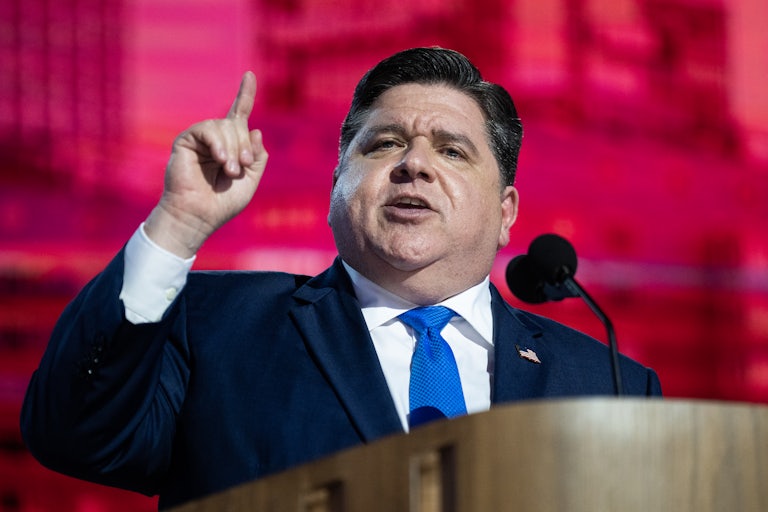 J.B. Pritzker gestures while speaking at the Democratic National Convention