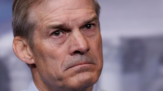 Representative Jim Jordan frowns during a news conference