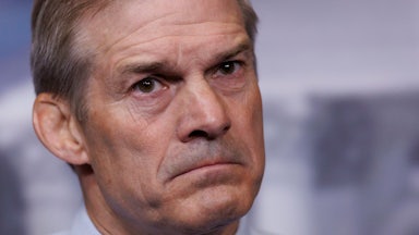Representative Jim Jordan frowns during a news conference