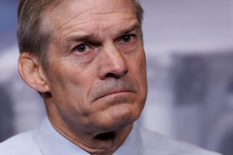 Representative Jim Jordan frowns during a news conference