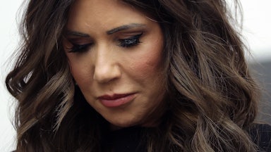 Homeland Security Secretary Kristi Noem looks downcast