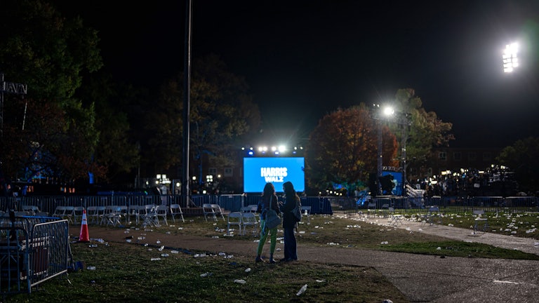 Litter dots a lawn after an election-night watch party for Kamala Harris at Howard University in Washington, D.C.