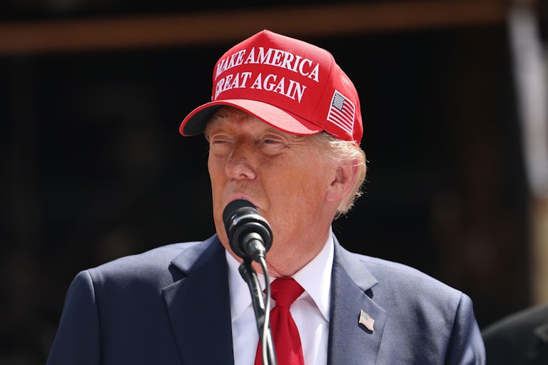 Donald Trump speaks into a microphone during a hurricane relief speech in Georgia