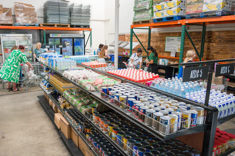 People pick up groceries at a food bank