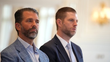Donald Trump Jr. and Eric Trump stand next to each other