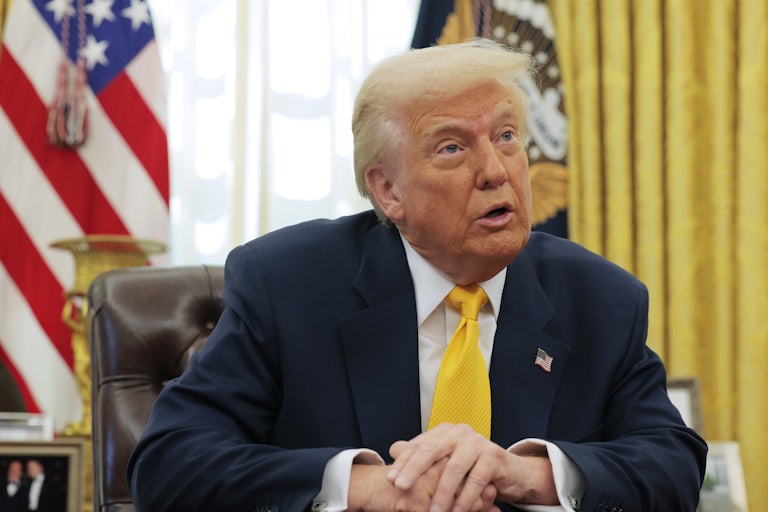 Donald Trump speaks from his desk in the White House’s Oval Office.