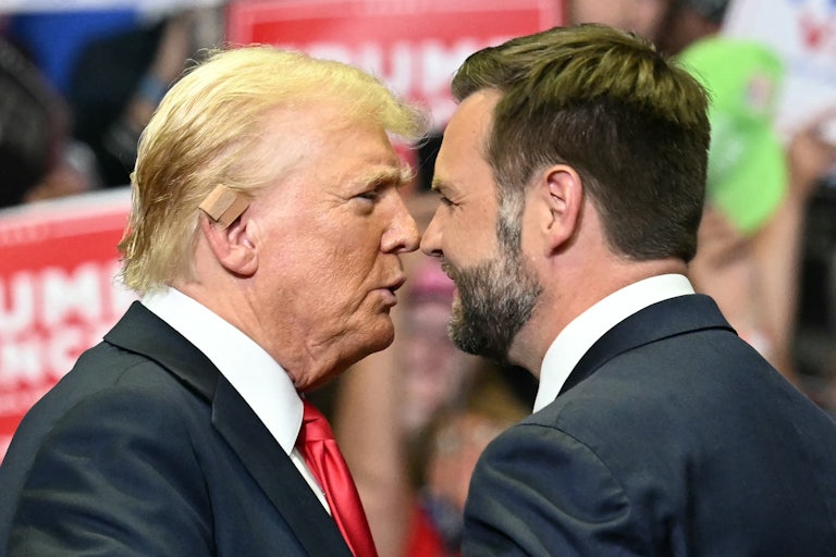 Donald Trump and J.D. Vance stand nose to nose at a campaign event