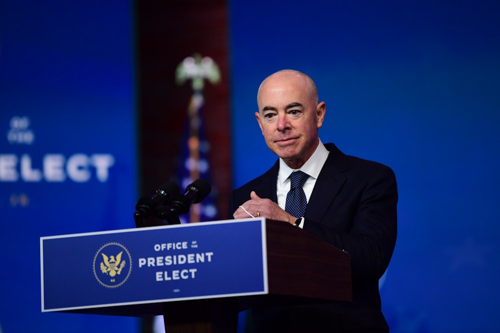 Secretary of Homeland Security nominee Alejandro Mayorkas removes speaks after being introduced by President-elect Joe Biden