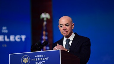 Secretary of Homeland Security nominee Alejandro Mayorkas removes speaks after being introduced by President-elect Joe Biden