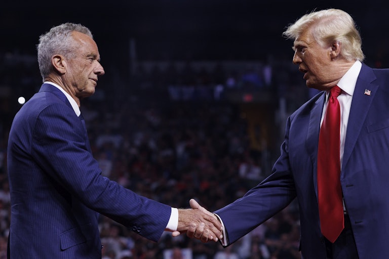 Robert F. Kennedy Jr. and Donald Trump shake hands