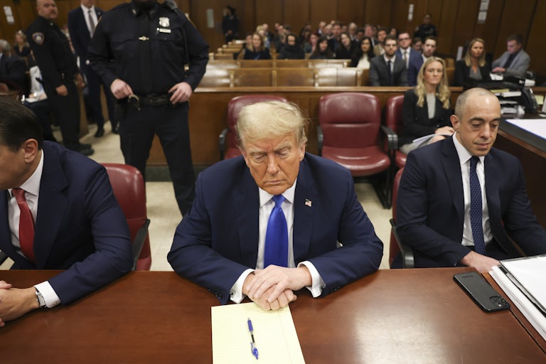 Donald Trump looks down