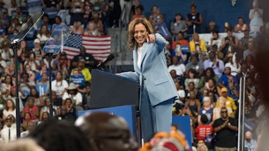 Kamala Harris points to the camera at a campaign rally in Atlanta.