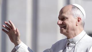 Pope Leo waves