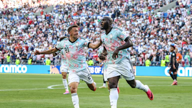 Belgian players celebrate after scoring a goal against the U.S. in the World Cup