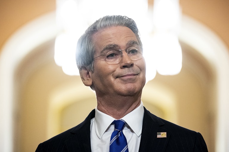 Treasury Secretary Scott Bessent stands in the Capitol