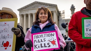 Demonstrators outside the Supreme Court