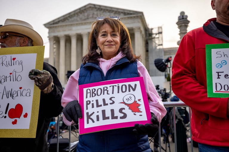 Demonstrators outside the Supreme Court