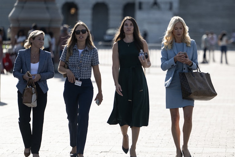 Survivors of Jeffery Epstein, from left to right, Danielle Bensky, Annie Farmer, and Theresa Helm walk with attorney Sigrid McCawley, outside the Capitol.