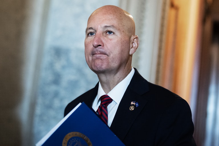 Senator Pete Ricketts frowns