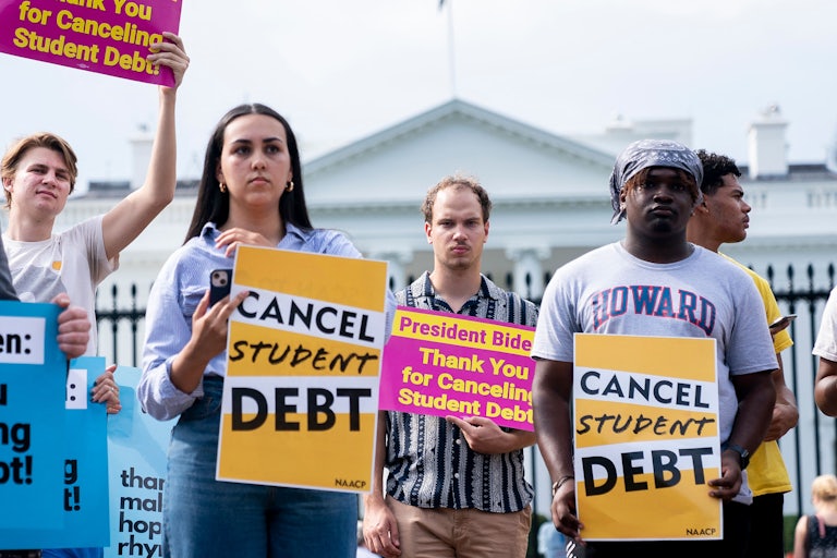 Activists gather in front of the White House to rally in support of cancelling student debt.