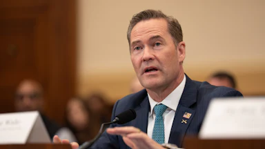U.S. Ambassador to the U.N. Mike Waltz gestures while speaking during a House committee hearing.