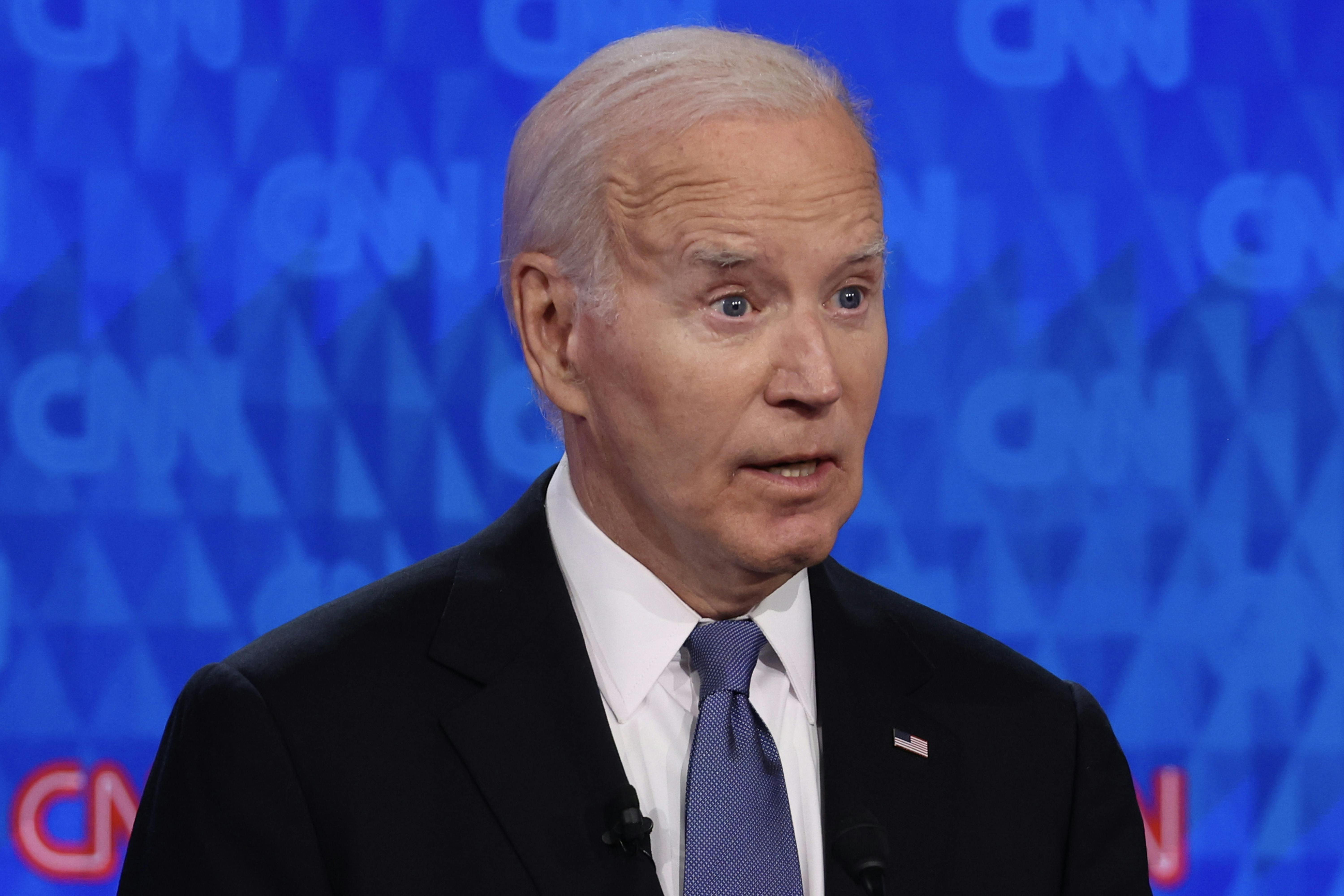 Joe Biden, looking very old, stares mid-sentence into the camera. 