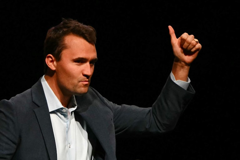 Charlie Kirk gives a thumbs-up