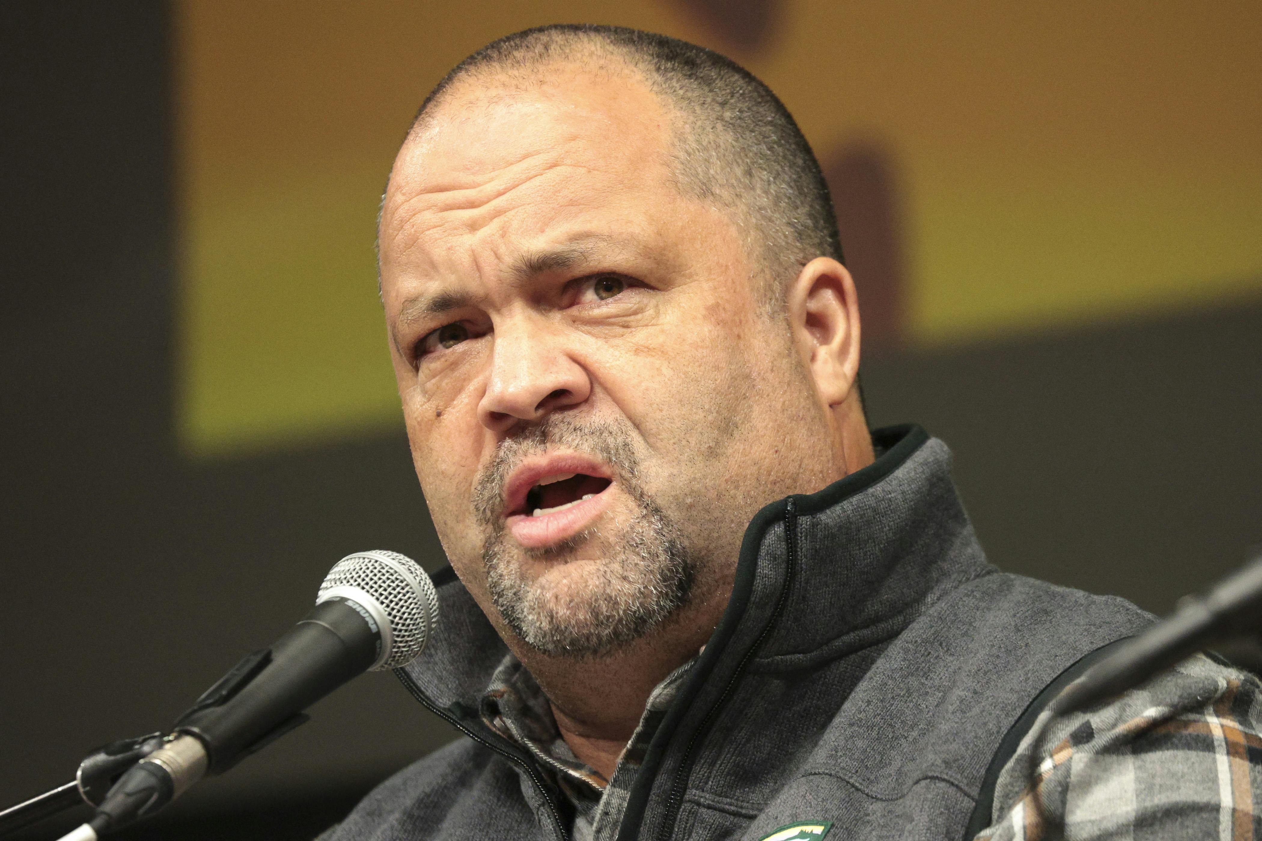 Sierra Club Executive Director Ben Jealous speaks into a microphone.