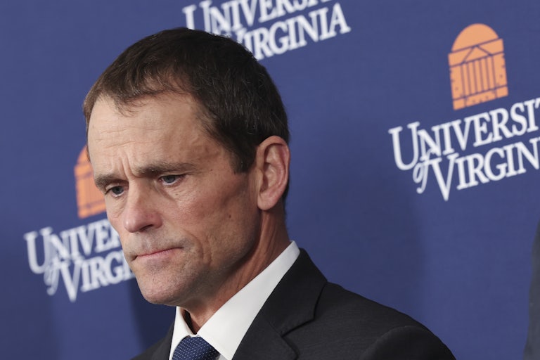 Former University of Virginia President James Ryan looks down during a press conference