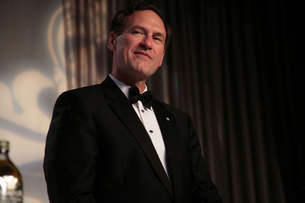 A tuxedo-clad Samuel Alito smirks.