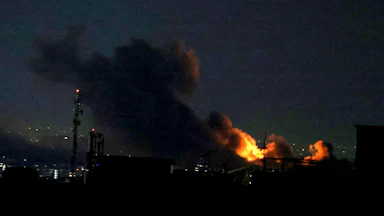 On March 29, a plume of smoke rose from the site of a strike in Tehran.