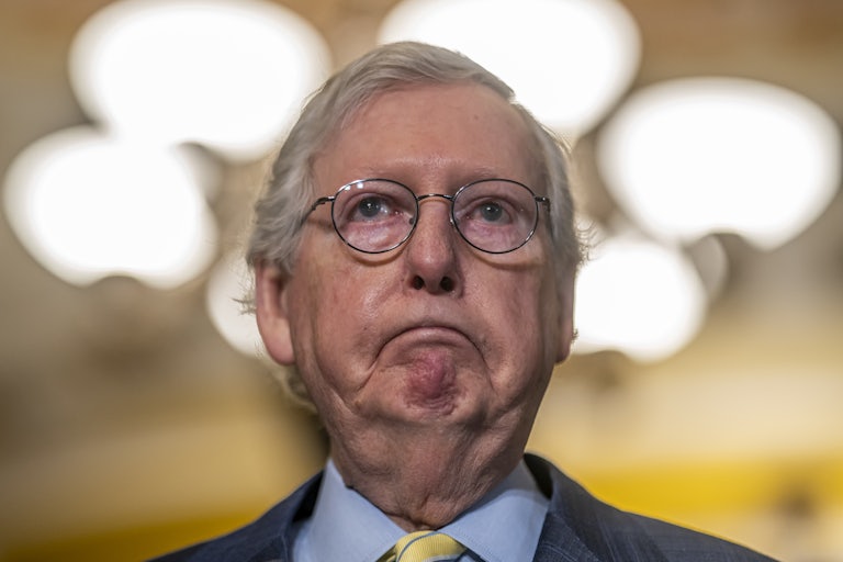 Mitch McConnell frowns
