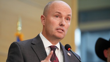 Spencer Cox speaking at a press conference