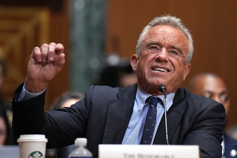 HHS Secretary RFK Jr. addresses the room at a Senate hearing.