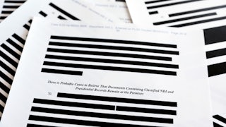 Pages from the government’s released version of the FBI search warrant affidavit for former President Donald Trump's Mar-a-Lago estate.