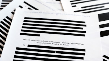 Pages from the government’s released version of the FBI search warrant affidavit for former President Donald Trump's Mar-a-Lago estate.